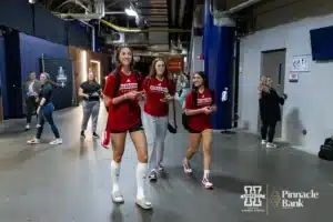 Nebraska Cornhuskers Merritt Beason (13), Bergen Reilly, and Lexi Rodriguez make their way to the lockerroom after open practice before the NCAA Semi-Finals, Wednesday, December 13, 2023, Tampa, Florida. Photo by John S. Peterson.