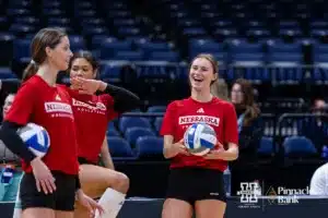 Nebraska Cornhusker Bergen Reilly (2),  Kennedi Orr (9), and Merritt Beason having fun during open practice before the NCAA Semi-Finals, Wednesday, December 13, 2023, Tampa, Florida. Photo by John S. Peterson.