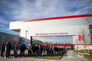 Nebraska Cornhusker fans wait in line for the Regional Championship match against the Arkansas Razorbacks in the NCAA Volleyball Championship Thursday, December 7, 2023, Lincoln, Neb. Photo by John S. Peterson.