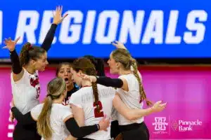 Nebraska Cornhuskers celebrates a point against the Georgia Tech Yellow Jackets in the first set during the third round in the NCAA Volleyball Championship match Thursday, December 7, 2023, Lincoln, Neb. Photo by John S. Peterson.