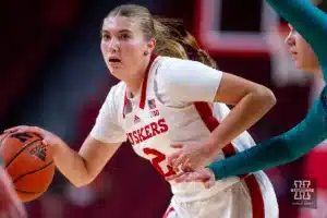 Nebraska Cornhusker guard Logan Nissley (2) dribbles the ball against the UNC Wilmington Seahawks in the first half during a college basketball game Tuesday, December 5, 2023, in Lincoln, Neb. Photo by John S. Peterson.