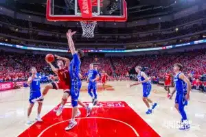 Nebraska Cornhusker guard Sam Hoiberg (1) tries to make a lay up against Creighton Bluejay center Ryan Kalkbrenner (11) in the second half during the men’s college basketball game on Sunday, December 3, 2023, in Lincoln, Neb. Photo by John S. Peterson.