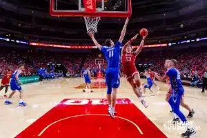 Nebraska Cornhusker forward Josiah Allick (53) tries for a layup against Creighton Bluejay center Ryan Kalkbrenner (11) in the second half during the men’s college basketball game on Sunday, December 3, 2023, in Lincoln, Neb. Photo by John S. Peterson.
