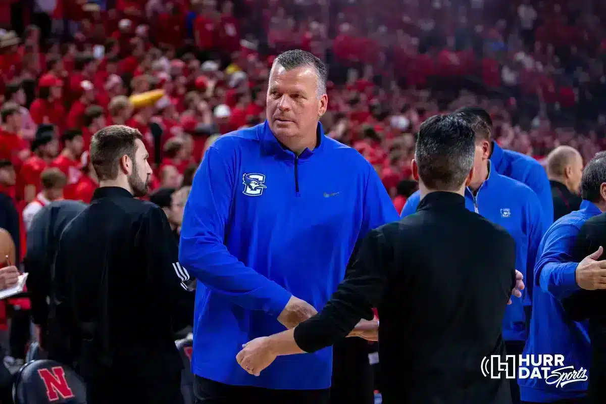 Creighton Bluejay head coach Greg McDermott hands hands with Nebraska Cornhusker assistant Luca Virgilio before the men’s college basketball game on Sunday, December 3, 2023, in Lincoln, Neb. Photo by John S. Peterson.