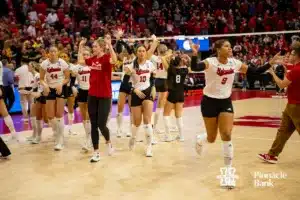 Nebraska Cornhuskers run back to the locker room after sweeping Missouri Tigers during the second round of the NCAA volleyball championships on Saturday, December 2, 2023, in Lincoln, Neb. Photo by John S. Peterson.