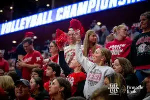 Nebraska Cornhuskers waving pom-poms against the Missouri Tigers during the second round of the NCAA volleyball championships on Saturday, December 2, 2023, in Lincoln, Neb. Photo by John S. Peterson.
