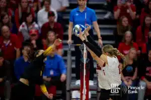 Nebraska Cornhusker Bergen Reilly (2) and Andi Jackson (15) blocks a shot from Missouri Tiger Dilara Gedikoglu (8) in the third set during the second round of the NCAA volleyball championships on Saturday, December 2, 2023, in Lincoln, Neb. Photo by John S. Peterson.