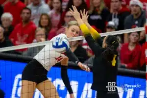 Nebraska Cornhusker Ally Batenhorst (14) spikes the ball past Missouri Tiger Jordan Iliff (4) in the first set during the second round of the NCAA volleyball championships on Saturday, December 2, 2023, in Lincoln, Neb. Photo by John S. Peterson.