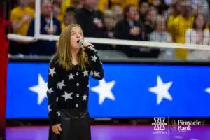 Ava Bonifas sings the National Anthem before the Nebraska takes on Missouri during the second round of the NCAA volleyball championships on Saturday, December 2, 2023, in Lincoln, Neb. Photo by John S. Peterson.