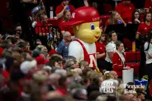 Nebraska Cornhuskers mascot Lil' Red watches the action on the court against the Long Island Sharks in the third set during the first round of the NCAA volleyball championships on Friday, December 1, 2023, in Lincoln, Neb. Photo by John S. Peterson.
