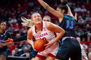 Nebraska Cornhusker center Alexis Markowski (40) fights for a shot against Florida Atlantic Owl center Evie Van Der Woude (13) in the second half during the basketball game on Wednesday, November 29, 2023, in Lincoln, Neb. Photo by John S. Peterson.