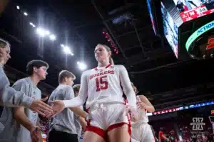 Nebraaska Cornhusker guard Kendall Moriarty (15) giving fives to the bench in the second half against the Florida Atlantic Owls during the basketball game on Wednesday, November 29, 2023, in Lincoln, Neb. Photo by John S. Peterson.