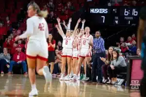 Nebraska Cornhuskers bench celebrates a three by guard Maddie Krull (42) in the first quarter during the basketball game on Wednesday, November 29, 2023, in Lincoln, Neb. Photo by John S. Peterson.