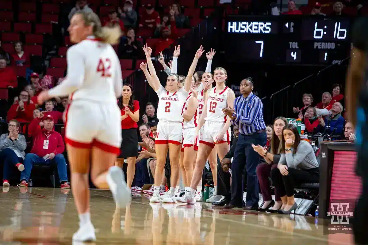 Nebraska Cornhuskers bench celebrates a three by guard Maddie Krull (42) in the first quarter during the basketball game on Wednesday, November 29, 2023, in Lincoln, Neb. Photo by John S. Peterson.