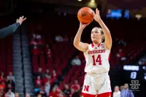 Nebraska Cornhusker guard Callin Hake (14) makes a three point shot in the first half against the Florida Atlantic Owls during the basketball game on Wednesday, November 29, 2023, in Lincoln, Neb. Photo by John S. Peterson.
