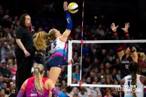 Omaha Supernovas Brooke Nuneviller (5) spikes the ball against the Atlanta Vibe during the first professional volleyball match in the United States on Wednesday, January 24, 2024, in Omaha, Nebraska. Photo by John S. Peterson.
