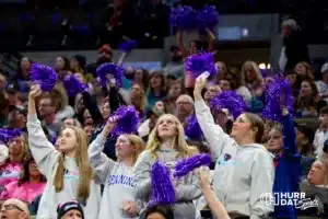 Omaha Supernovas fans waving poms at a break in the action against the Atlanta Vibe during the first professional volleyball match in the United States on Wednesday, January 24, 2024, in Omaha, Nebraska. Photo by John S. Peterson.