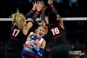 Omaha Supernovas Jess Schaben-Lansman (10) spikes the ball against Atlanta Vibe Alli Linnehan (17) and Karis Watson (16) during the first professional volleyball match in the United States on Wednesday, January 24, 2024, in Omaha, Nebraska. Photo by John S. Peterson.