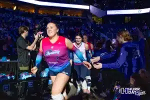 Omaha Supernovas Kendall White (3) runs out on to the court to take on the Atlanta Vibe during the first professional volleyball match in the United States on Wednesday, January 24, 2024, in Omaha, Nebraska. Photo by John S. Peterson.