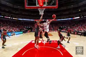 Nebraska Cornhusker guard C.J. Wilcher (0) makes a lay up against Ohio State Buckeye forward Zed Key (23) in the second half during a college basketball game on Tuesday, January 23, 2024, in Lincoln, Nebraska. Photo by John S. Peterson.