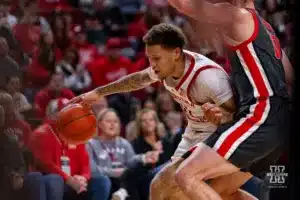 Nebraska Cornhusker guard Eli Rice (11) dribbles the ball against Ohio State Buckeye forward Jamison Battle (10) in the first half during a college basketball game on Tuesday, January 23, 2024, in Lincoln, Nebraska. Photo by John S. Peterson.