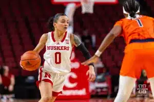 Nebraska Cornhusker guard Darian White (0) drives to the lane against Illinois Fighting Illini guard Genesis Bryant (1) in the second half during a college basketball game on Thursday, January 11, 2024, in Lincoln, Nebraska. Photo by John S. Peterson.