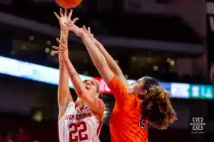 Nebraska Cornhusker forward Natalie Potts (22) makes a lay up against Illinois Fighting Illini forward Brynn Shoup-Hill (23) in the first half during a college basketball game on Thursday, January 11, 2024, in Lincoln, Nebraska. Photo by John S. Peterson.