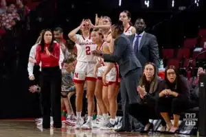 Nebraska Cornhuskers bench celebrates a three in the first half against the Illinois Fighting Illini during a college basketball game on Thursday, January 11, 2024, in Lincoln, Nebraska. Photo by John S. Peterson.