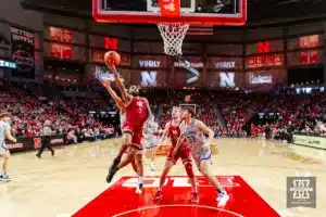 Nebraska Cornhusker guard Brice Williams (3) makes a lay up against Northwestern Wildcat forward Luke Hunger (33) in the first half during a college basketball game on Saturday, January 20, 2024, in Lincoln, Nebraska. Photo by John S. Peterson.