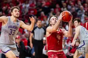 Nebraska Cornhusker guard Sam Hoiberg (1) makes lay up against Northwestern Wildcat forward Luke Hunger (33) in the second half during a college basketball game on Saturday, January 20, 2024, in Lincoln, Nebraska. Photo by John S. Peterson.