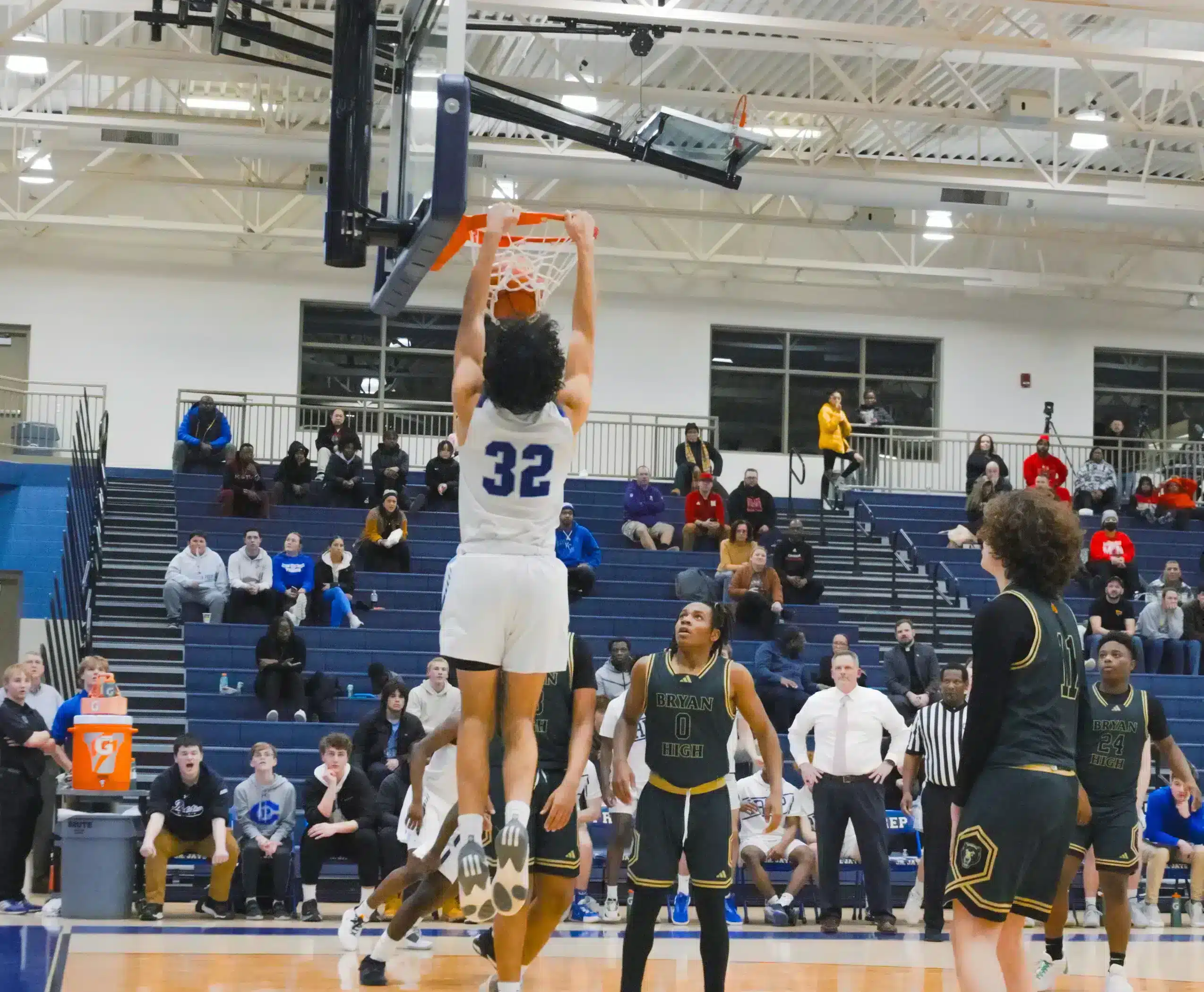 Creighton prep junior Trinell Parker caps a 16-point performance with a fourth-quarter dunk against Omaha Bryan.