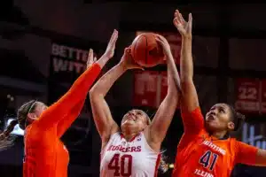 Nebraska Cornhusker center Alexis Markowski (40) grabs the rebound against Illinois Fighting Illini forward Kendall Bostic (44) and Camille Hobby in the first half during a college basketball game on Thursday, January 11, 2024, in Lincoln, Nebraska. Photo by John S. Peterson.
