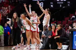 Nebraska Cornhuskers bench celebrates a three point shot in the first half against the Illinois Fighting Illini during a college basketball game on Thursday, January 11, 2024, in Lincoln, Nebraska. Photo by John S. Peterson.