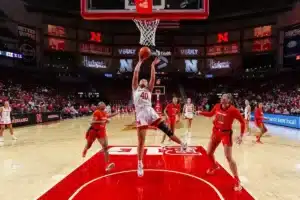 Nebraska Cornhusker center Alexis Markowski (40) makes a lay up against Illinois Fighting Illini forward Kendall Bostic (44) in the first hald during a college basketball game on Thursday, January 11, 2024, in Lincoln, Nebraska. Photo by John S. Peterson.