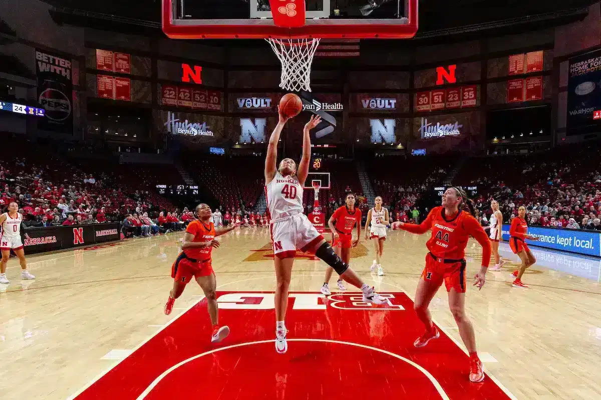 Nebraska Cornhusker center Alexis Markowski (40) makes a lay up against Illinois Fighting Illini forward Kendall Bostic (44) in the first hald during a college basketball game on Thursday, January 11, 2024, in Lincoln, Nebraska. Photo by John S. Peterson.