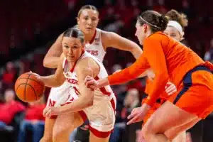 Nebraska Cornhusker guard Callin Hake (14) drives to the basket against the Illinois Fighting Illini in the second half during a college basketball game on Thursday, January 11, 2024, in Lincoln, Nebraska. Photo by John S. Peterson.