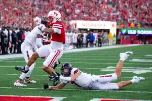 Nebraska Cornhuskers Billy Kemp IV (1) scores a touchdown in the first quarter against NIU Huskies Jordan Hansen (7) during a college football game in Lincoln, Nebraska, Friday, September 15, 2023. Photo by John Peterson.