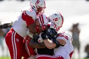 Elijah Jeudy (16), John Bullock (5), and Luke Reimer (4) of the Nebraska Cornhuskers tackle A.Hankerson (9) of the Colorado Buffaloes during a college football game in Boulder, Colorado, Friday, September 9, 2023. Photo by John Peterson.