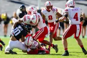 Nebraska Cornhuskers Javin Wright (33) and Malcolm Hartzog (13) stops wide receiver Xavier Weaver (10) of the Colorado Buffaloes in the first quarter during a college football game in Boulder, Colorado, Friday, September 9, 2023. Photo by John Peterson.