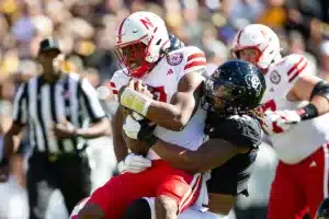 quarterback Jeff Sims (7) of the Nebraska Cornhuskers stopped by linebacker Taje McCoy (40) of the Colorado Buffaloes in the first quarter during a college football game in Boulder, Colorado, Friday, September 9, 2023. Photo by John Peterson.