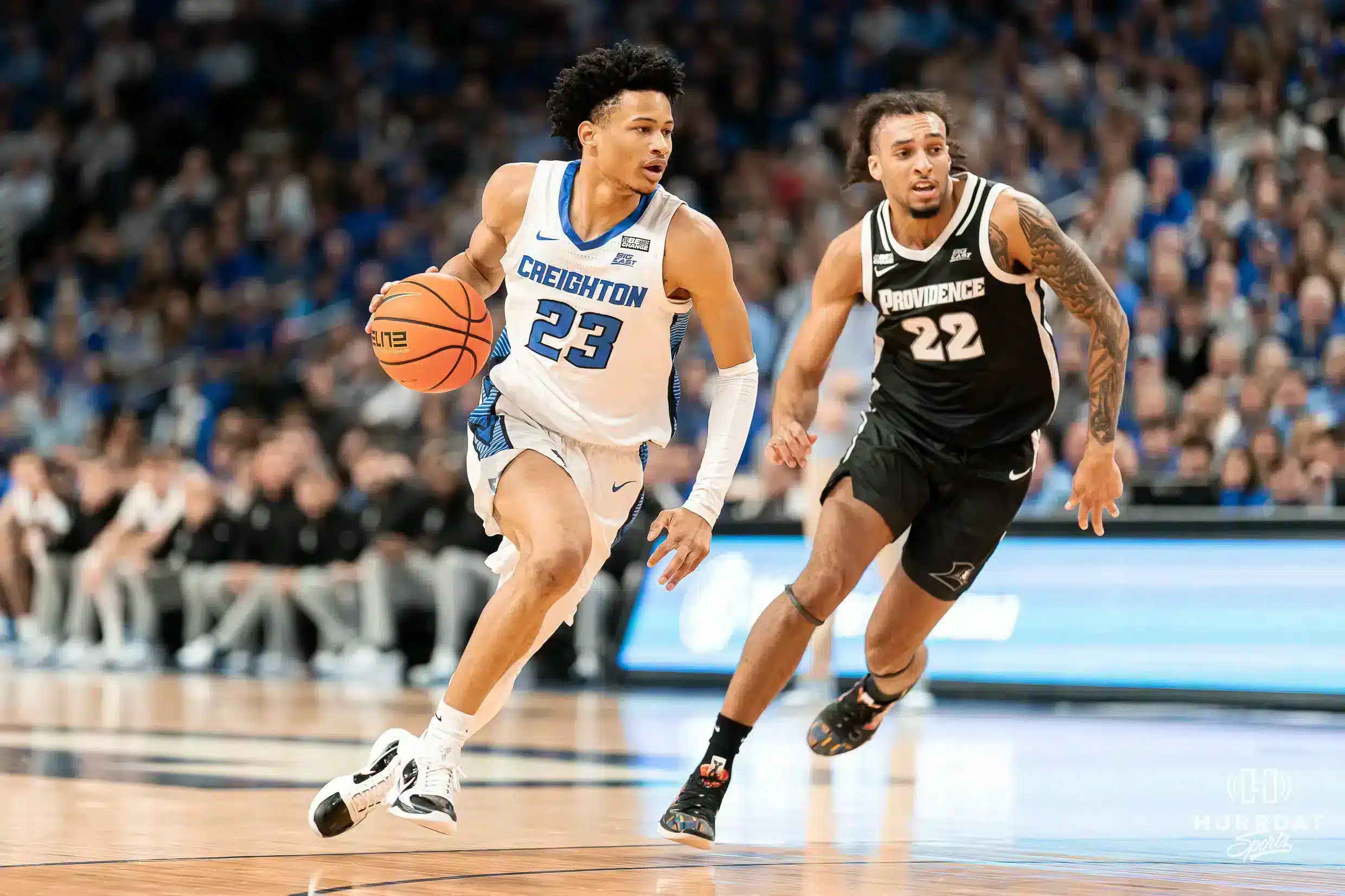 Omaha, Basketball, Creighton Creighton Bluejays guard Trey Alexander #23 drives to the basket past Providence Friars guard Devin Carter #22 during at the CHI Health Center in Omaha, NE January 6rth 2024. Photo by Eric Francis