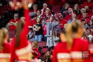 Nebraska Cornhuskers fan cheering at a break in the action against the Maryland Terrapins during a college basketball game on Sunday, December 31, 2023, in Lincoln, Nebraska. Photo by John S. Peterson.