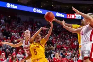 Nebraska Cornhusker forward Natalie Potts (22) and Nebraska Cornhusker center Alexis Markowski (40) battle for the ball against the Maryland Terrapins in the first quarter during a college basketball game on Sunday, December 31, 2023, in Lincoln, Nebraska. Photo by John S. Peterson.