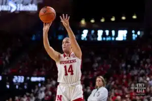 Nebraska Cornhusker guard Callin Hake (14) makes basket against the Minnesota Golden Gophers in the first half during a college basketball game Saturday, February 24, 2024, in Lincoln, Neb. Photo by John S. Peterson.