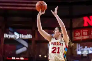 Nebraska Cornhusker forward Annika Stewart (21) makes a three point shot against the Northwestern Wildcats in the first quarter during a college basketball game Tuesday, February 20, 2024, in Lincoln, Neb. Photo by John S. Peterson.