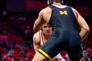 184: Nebraska Cornhusker No. 3 Lenny Pinto (16-3) wrestles Michigan Wolverine No. 18 Jaden Bullock (13-7) during a college wrestling match on Friday, February 9, 2024, in Lincoln, Nebraska. Photo by John S. Peterson.