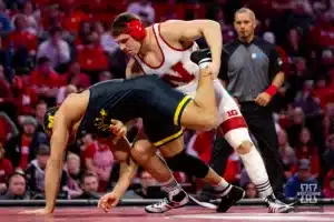 184: Nebraska Cornhusker No. 3 Lenny Pinto (16-3) wrestles Michigan Wolverine No. 18 Jaden Bullock (13-7) during a college wrestling match on Friday, February 9, 2024, in Lincoln, Nebraska. Photo by John S. Peterson.