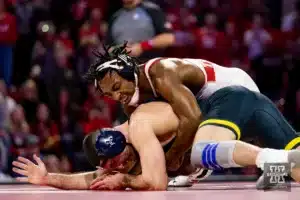 165: Nebraska Cornhusker No. 16 Antrell Taylor (15-4) wrestles Michigan Wolverine No. 10 Cameron Amine (8-4) during a college wrestling match on Friday, February 9, 2024, in Lincoln, Nebraska. Photo by John S. Peterson.