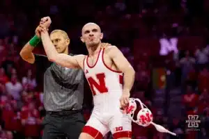 Nebraska Cornhusker No. 7 Brock Hardy (13-5) has his hand held up for the win over Michigan Wolverine No. 4 Dylan Ragusin (20-0) during a college wrestling match on Friday, February 9, 2024, in Lincoln, Nebraska. Photo by John S. Peterson.