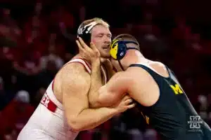 HWT: Nebraska Cornhusker Nash Hutmacher (4-1) wrestles Michigan Wolverine No. 6 Lucas Davison (11-3) during a college wrestling match on Friday, February 9, 2024, in Lincoln, Nebraska. Photo by John S. Peterson.